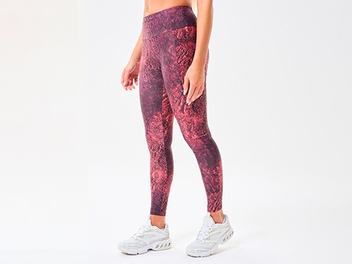 Calza deportiva lycra estampada con bolsillo lateral