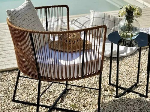 Sillón individual de exterior Gervasoni en metal con almohadon